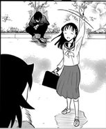 Waving to Tomoko after passing her exam.
