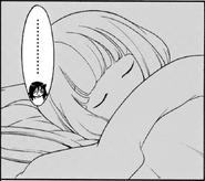 Tomoko stares at Uchi's sleeping face.
