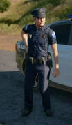 Policial armado do DPSF/DPO.