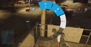 The DDoS in the weapon wheel. Note that in this alpha build of Watch Dogs 2, the icon for this weapon is of an M1014 shotgun.