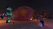 The battledome with sculptures flanking it.