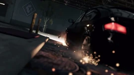 Aiden driving a car in the complex of the center