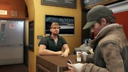 Aiden takes coffee in Brewed Delight.