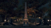 View of the obelisk and lion statues from the River Thames.
