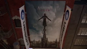 Assassin's Creed movie poster on the front of the studio.