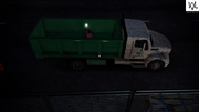 Marcus using an Oakland Dump Truck as a hiding spot while operating his Quadcopter.