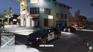 A player-controlled OPD Cruiser with spotlights activated, the result of a glitch.