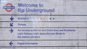 While all other signage uses colors instead of actual line names, this sign mentions the Circle, District, and Docklands Light Railway lines by name.