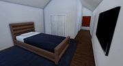 The first bedroom of a one-story home.