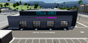 The back of the Cars & Motorcycles Dealership featuring the four garage slots.