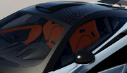 The 600LT Coupe with the "MSO Defined Carbon Fiber Roof Scoop" stock option equipped.