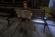 A Wellie reading the newspaper on a bench.