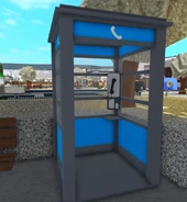 A decorative phone booth outside the theater.