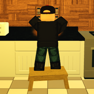 A player using a step stool to reach the counter as kid.