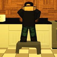A player using a step stool to reach the counter as kid.