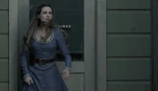 Dolores in front of O'Rourke's clinic in the evening