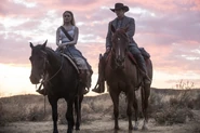 Dolores and Teddy on horseback