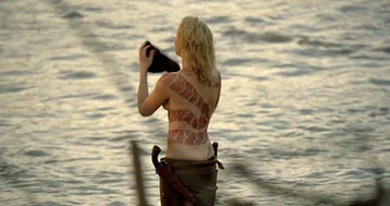 The Woman with the Snake Tattoo