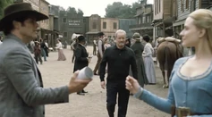 Mr delos in sweetwater.png (1.43 MB) James Delos observing the frozen host demonstration in Sweetwater during Westworld's early years