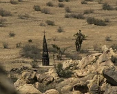 Ford visits the site of the buried church with the young Ford host