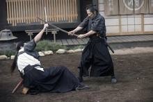 Musahi using his katana on another host