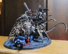 Warsmith Hadrax, Fabricator of Ruin atop his helstalker, Zopherinae