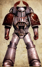 World Eaters Assault Legionary clad in modified Mk IV power armour, the chest pauldron wrought by Legion artificers into a form redolent of the World Eaters icon. The helm's distinctive 'Cadaere Remissum' side panels are a throwback to the fighting pits in which the Primarch Angron once fought, signifying a warrior whose sanity had been burned away by lust for battle. Such warriors were regarded as blessed, for they were cleansed of all cares other than war.