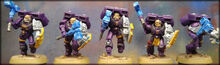 Vanguard Veterans with thunder hammers and storm shields.