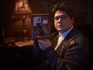 Guillermo in his room with a photo of himself as Armand.