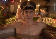 Minogue enjoys Kevin's spa pool on Christmas Eve.