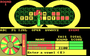 Game in progress as "Vanna" goes to turn over an E in the puzzle