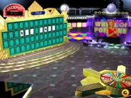 Jackpot round w/ Vanna clapping on video monitor while the Wheel spins