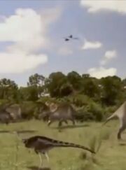 Quetzalcoatlus flying above below of Triceratops and Ornithomimus