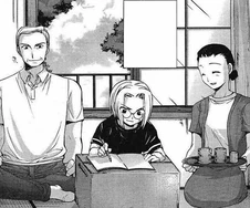 Young Irie and his parents, manga illustration by Karin Suzuragi