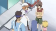 Yoshirō giving the doll