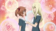 Rena hopes "Big Sister" will adjust her crocked scarf.