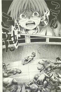 Tomita watches in horror as all the sheltered collapse