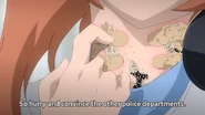 Rena scratches at her neck.