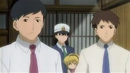 Komiyama and Kumagai during the arrest of Teppei