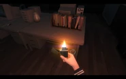 Location of Pottery It is found in the drawer of desk. A pottery is on the desk, which the music teacher had same shape item and is in the inside the drawer of desk of the photo.