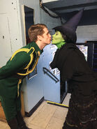 Jonah Platt giving a quick kiss to Elphaba (Rachel Tucker)