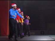 The Wiggles in their Santa hats