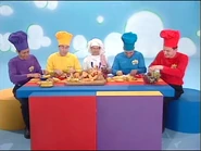 The Wiggles and Paul making fruit salad