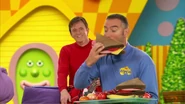 Anthony eating sandwich in "Racing to the Rainbow"