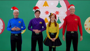 The Wiggles in their Santa hats