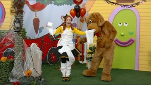 The original plywood car in the background