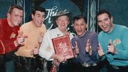 The Wiggles and Slim Dusty in a promo picture