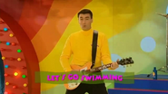 Greg playing the yellow Maton electric guitar