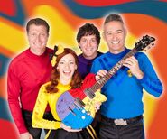 The Wiggles holding Maton guitar in 2018 picture