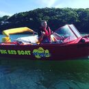 Anthony in the Big Red Boat